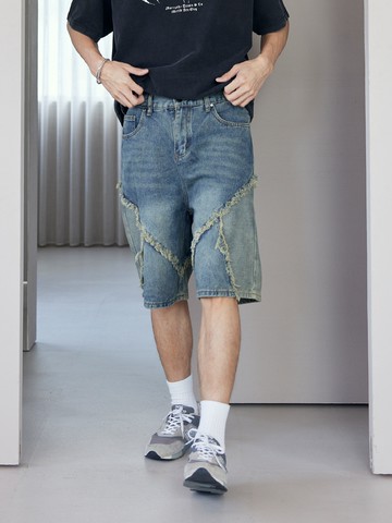 潮流抽鬚拼接牛仔短褲