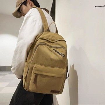 。初中生書包男2024年新款初一男款女款高中生中學生雙肩包復古帆