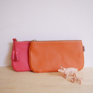 流蘇拉骨手拿包