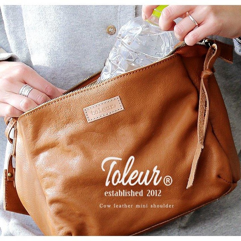 美品本革Toleur 牛革サークルショルダーバッグ レディース CA