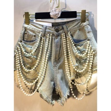 歐洲站2025夏裝新款手工串珠珍珠鏈條高腰顯瘦拉絲破洞牛仔短褲女