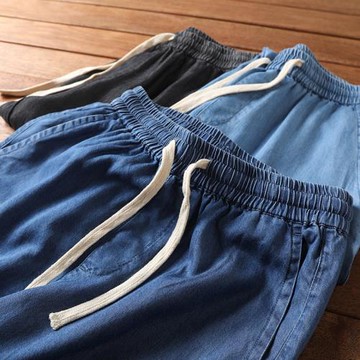 日單高貨！100天絲涼感透氣！夏季男士柔軟垂感松緊腰束口牛仔褲