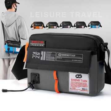 男士斜挎包2026新款時尚潮男包日系牛津布帆布郵差包大容量單肩包