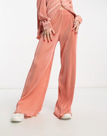 The Frolic plisse wide leg trouser co-ord in in cantaloupe orange