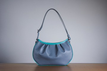 真皮微笑酒窩月牙肩背包