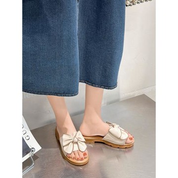 2025夏季新款蝴蝶結露趾平底百搭舒適黑色真皮涼拖鞋女外穿沙灘鞋