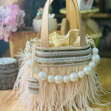 編織水葫蘆包小廣場橙桃羽毛刺繡