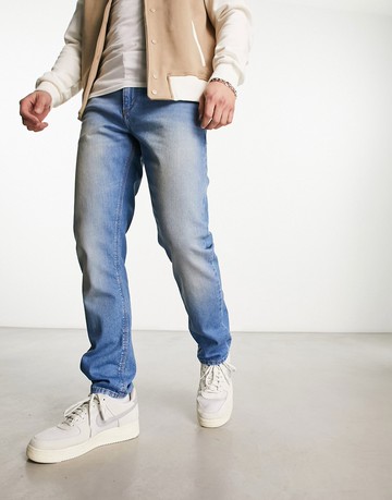 ASOS DESIGN slim jeans in mid wash blue
