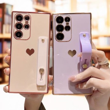 適用三星S25手機軟殼A56電鍍愛心腕帶支架Galaxy硅膠A17全包氣囊防摔保護套S24Ultra女A55新款A35純色FE簡約