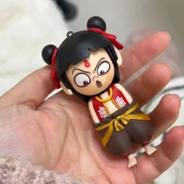 哪吒錶情包變臉魔童鬧海變臉玩具按壓變臉掛件擺件趣味創意