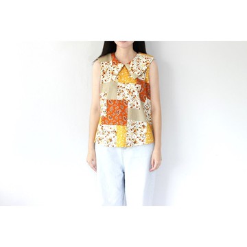 前後三角形領拼接無袖上衣，黃色調