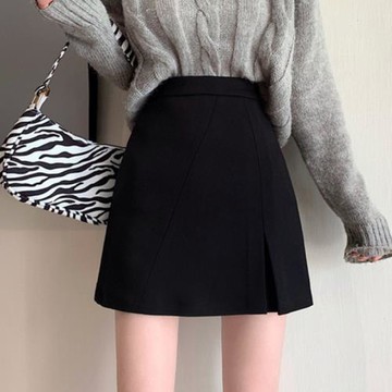 毛呢半身裙秋冬女設計感不規則遮胯包臀裙a字大碼胖mm短裙配毛衣