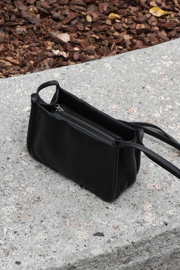 真皮羊皮旅行斜挎包大容量超輕