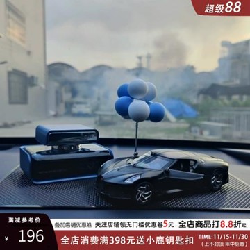 汽車中控臺賽車擺件2024年網紅車內擺件男士創意高檔公仔車載香水