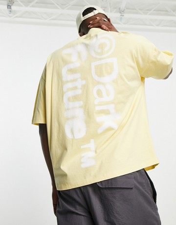 ASOS Dark Future oversized t-shirt with front and back blurred graphic prints in yellow