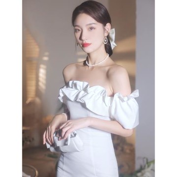 白色一字肩晚禮服女2025新款輕奢小眾高端宴會主持人高級感魚尾裙