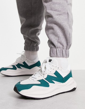 New Balance 5740 trainers in off white and green