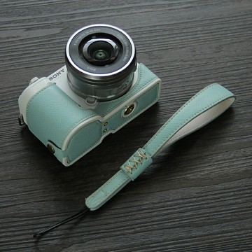 適用索尼ZVE10ii二相機套A6700半套底座皮革A7C2皮套A6400a6100