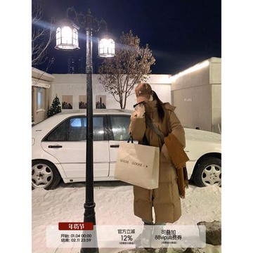 烏77純色溫柔面包可拆卸連帽羽絨服女韓版加厚保暖過膝中長款外套