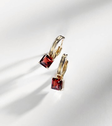 Stone and Strand 10kt gold earrings with garnets