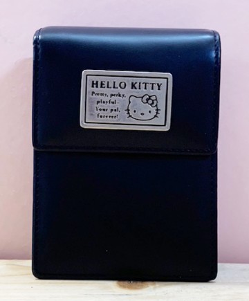 【震撼精品百貨】Hello Kitty 凱蒂貓~日本SANRIO三麗鷗KITTY化妝包/收納包-皮革25th黑*44149