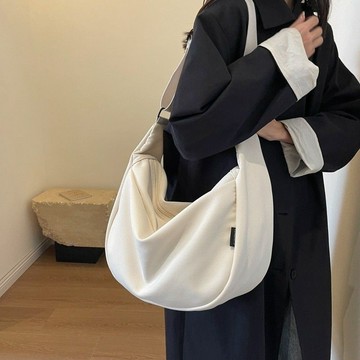大容量簡約帆布揹包百搭寬肩帶斜挎包大學生休閒單肩包通勤餃子包