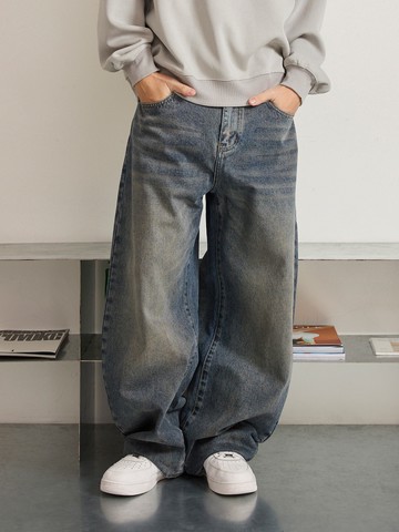 洗舊彎刀寬鬆牛仔長褲