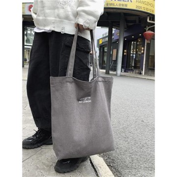 帆布單肩包男生港風文藝帆布手提袋日系大學生上課拉鏈大容量背包