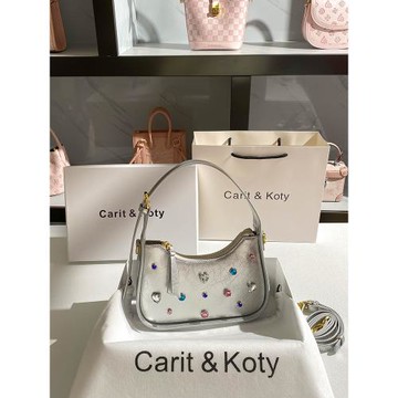 Carit Koty今年流行銀色包包女2025秋冬新款高級感水鉆法棍腋下包