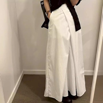 MOCO韓版chic小眾百搭高腰鬆緊腰斜不規則遮跨顯瘦壓褶設計感長裙