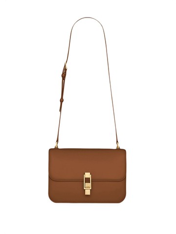 Saint Laurent - debossed-logo crossbody bag - women - Calf Leather - One Size - Brown