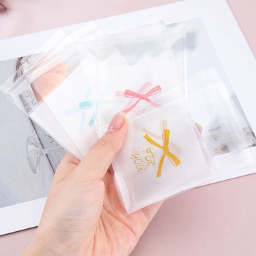 高顏值自封袋 零食 小卡打包袋50個 白底粉色蝴蝶結7*7cm自粘袋包裝袋小包裝高顏值飾品收納袋 自黏袋 透明包裝袋