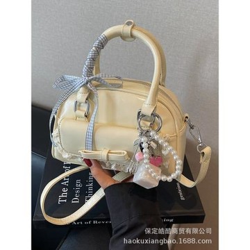 高級感洋氣小包包女夏季2025新款時尚小眾設計斜挎包手提保齡球包
