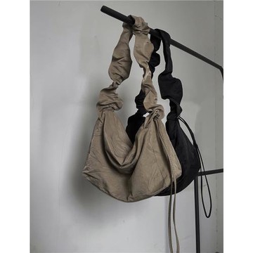 浮木兮/小眾設計款抽繩兩用單肩斜挎包百搭大容量休閑包包男女