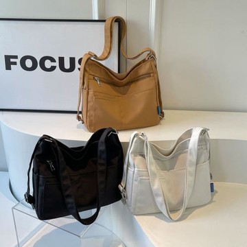 日系簡約帆布斜挎包ins大容量休閑多兜純色學生單肩包郵差包