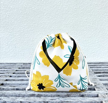 在這TSAI CHE 日系印花束口包 朝氣黃花款∣棉布∣手作包∣布包