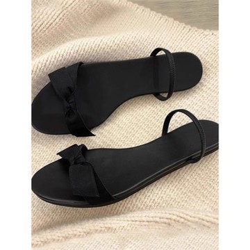 涼拖女夏外穿2025新款甜美蝴蝶結一字帶平底沙灘拖鞋小眾真皮涼鞋