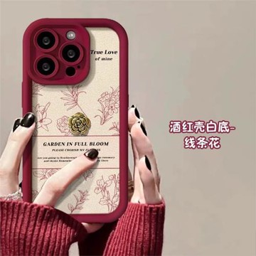 線條花朵適用蘋果16promax手機殼新款紅色女高檔小羊皮iphone15plus全包防摔立體山茶花飾品磨砂硅膠網紅創意