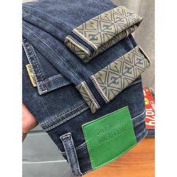 印花秋季牛仔長褲男高端潮流藍色彈力修身小腳斜插袋九分褲古士狼