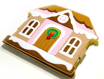 有手指木偶的聖誕屋。安靜的書