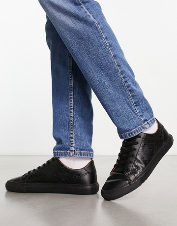 ASOS DESIGN lace up trainers with monogram print in black gloss