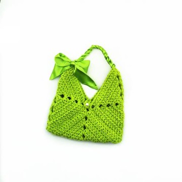 凹造型手提鏤空休閑珍珠草編包