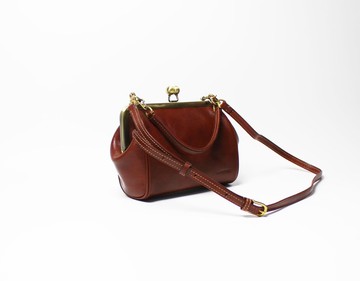 口金植鞣手提側背包