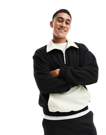 ASOS DESIGN oversized funnel neck half zip polar fleece sweatshirt in black with contrast pocket