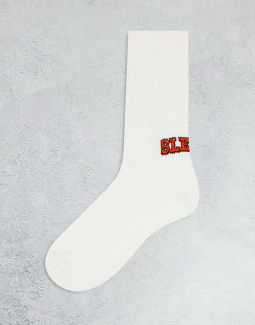 ASOS DESIGN sports socks with sleepy slogan in off-white